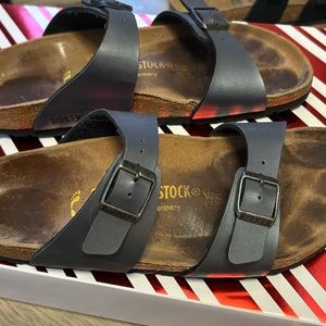 Like New Birkenstocks size 38. Some markings in sole from use one or two times.